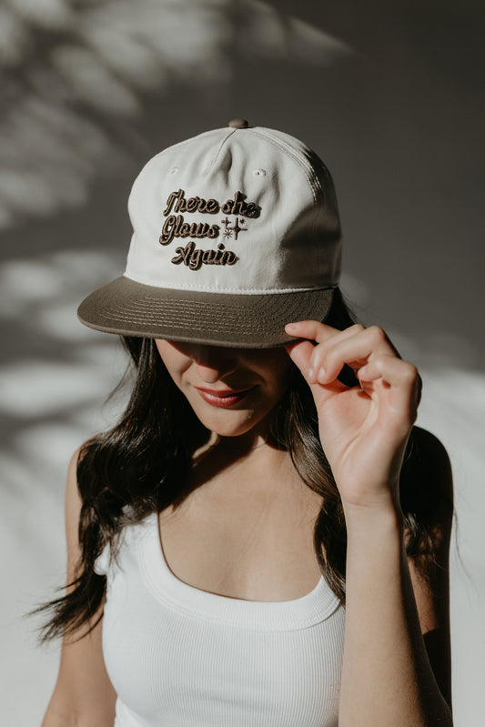 There She Glows Again Snapback Hat